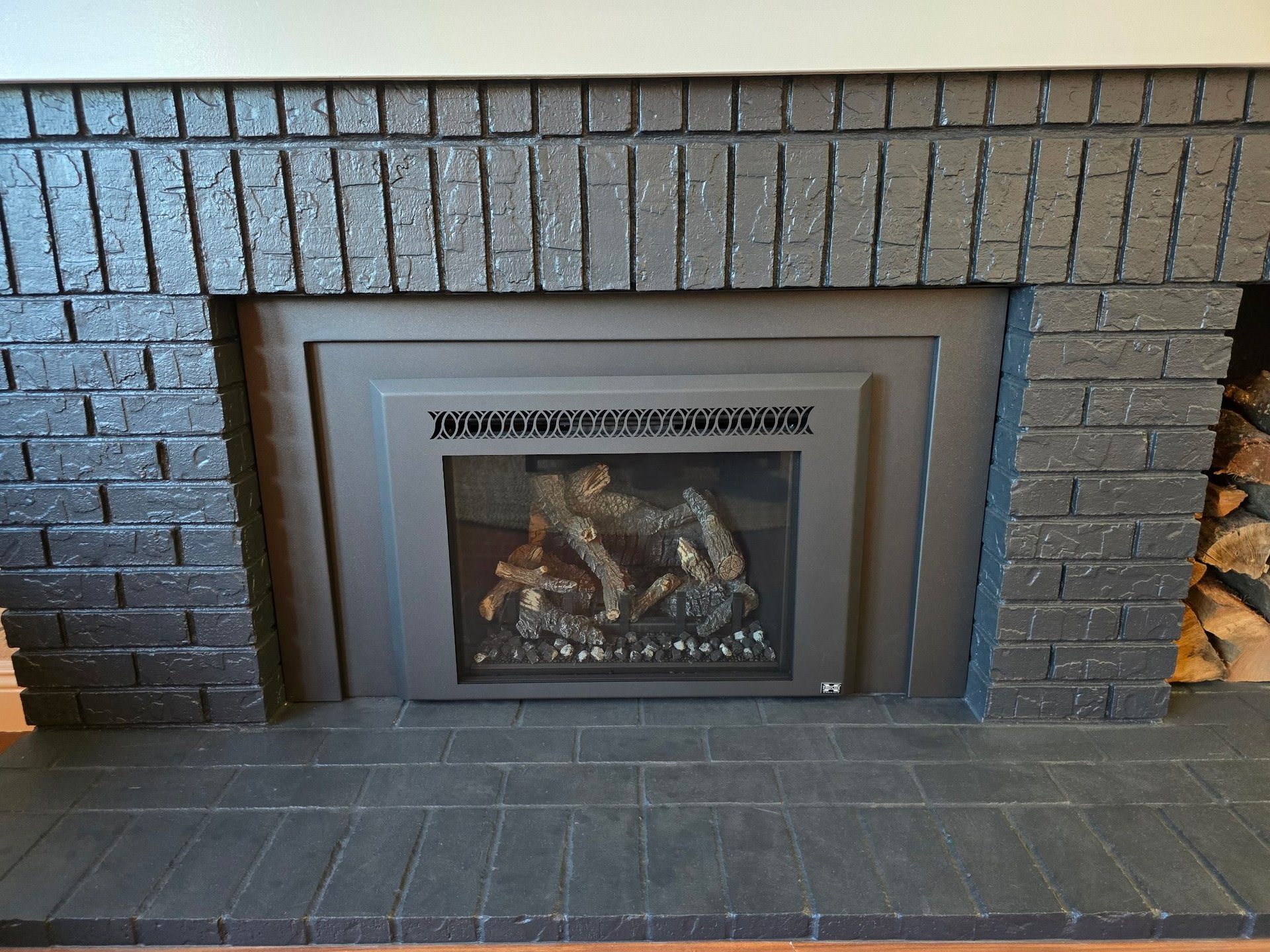 Dark brick fireplace